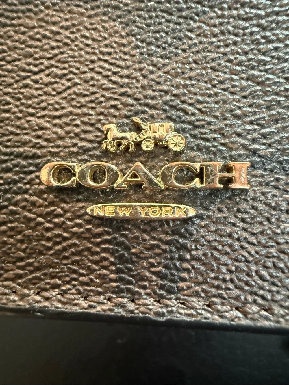 Coach Small Trifold Wallet crafted in Signature coated canvas